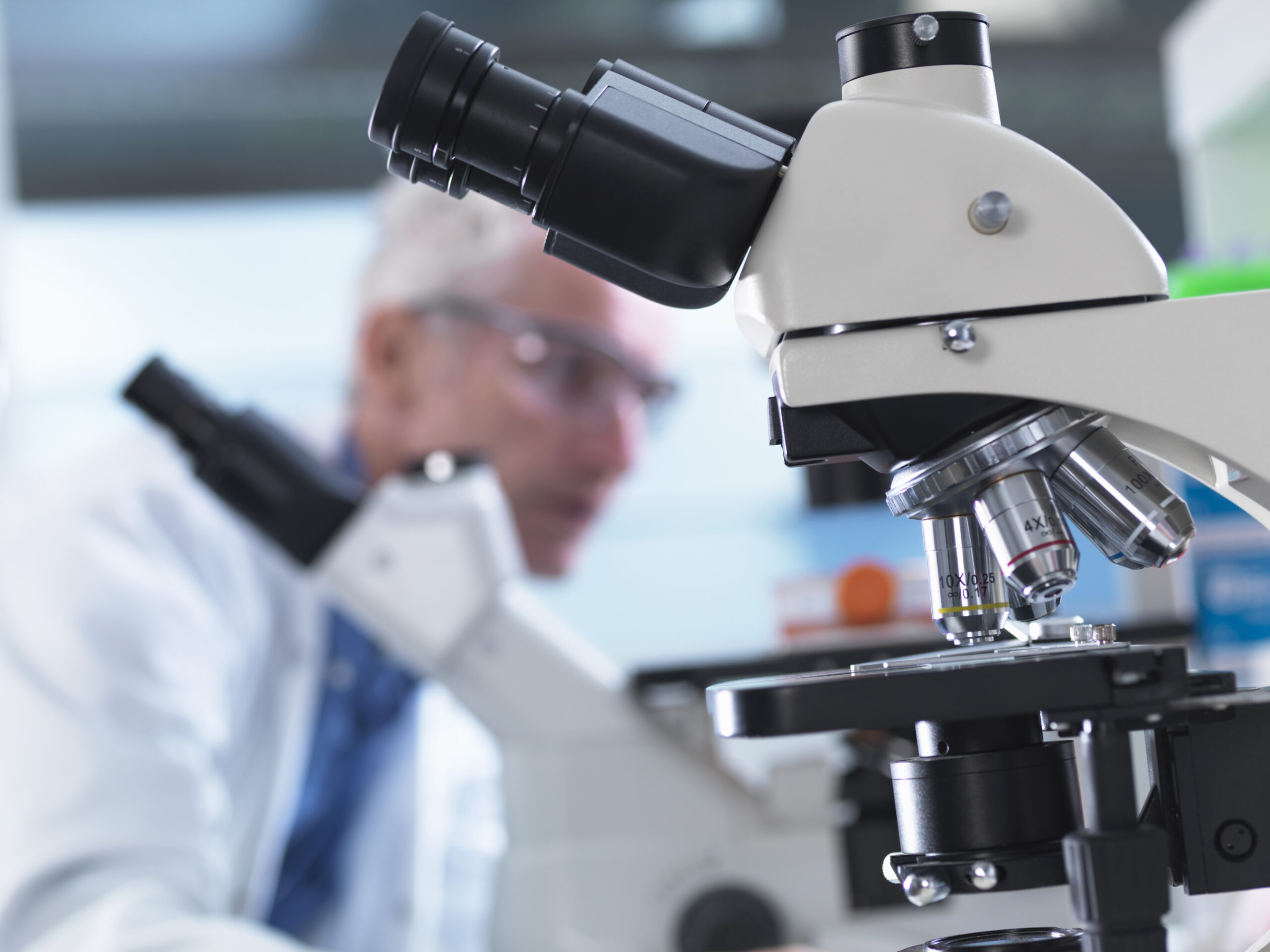 Microscope being used by Adam Veige at Oboro Labs to view a patented catalyst for mass producing cyclic polymers.